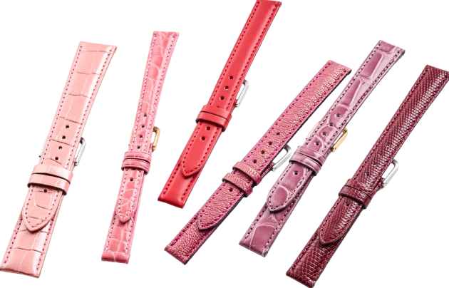 ピンク、レッド、ワインカラーなど色とりどりに並んだ6本の時計ベルト